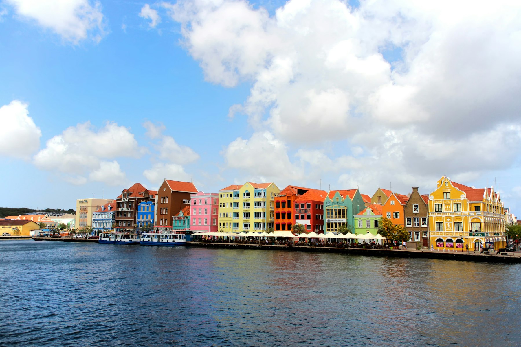 Colourful buildings on the Handelskade waterfront in Willemstad, Curaçao, Caribbean, seen from the Queen Emma Bridge